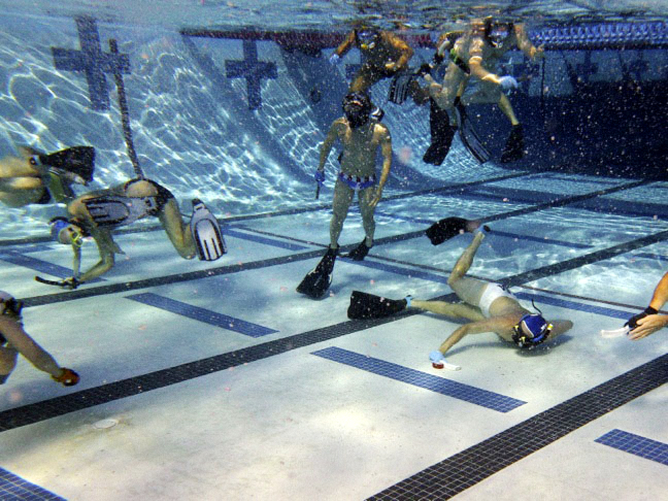 Lyndon Rive playing underwater hockey