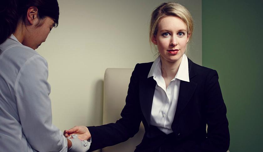 Theranos founder and CEO Elizabeth Holmes in Palo Alto in January, undergoing one of her company's finger-stick diagnostic tests.