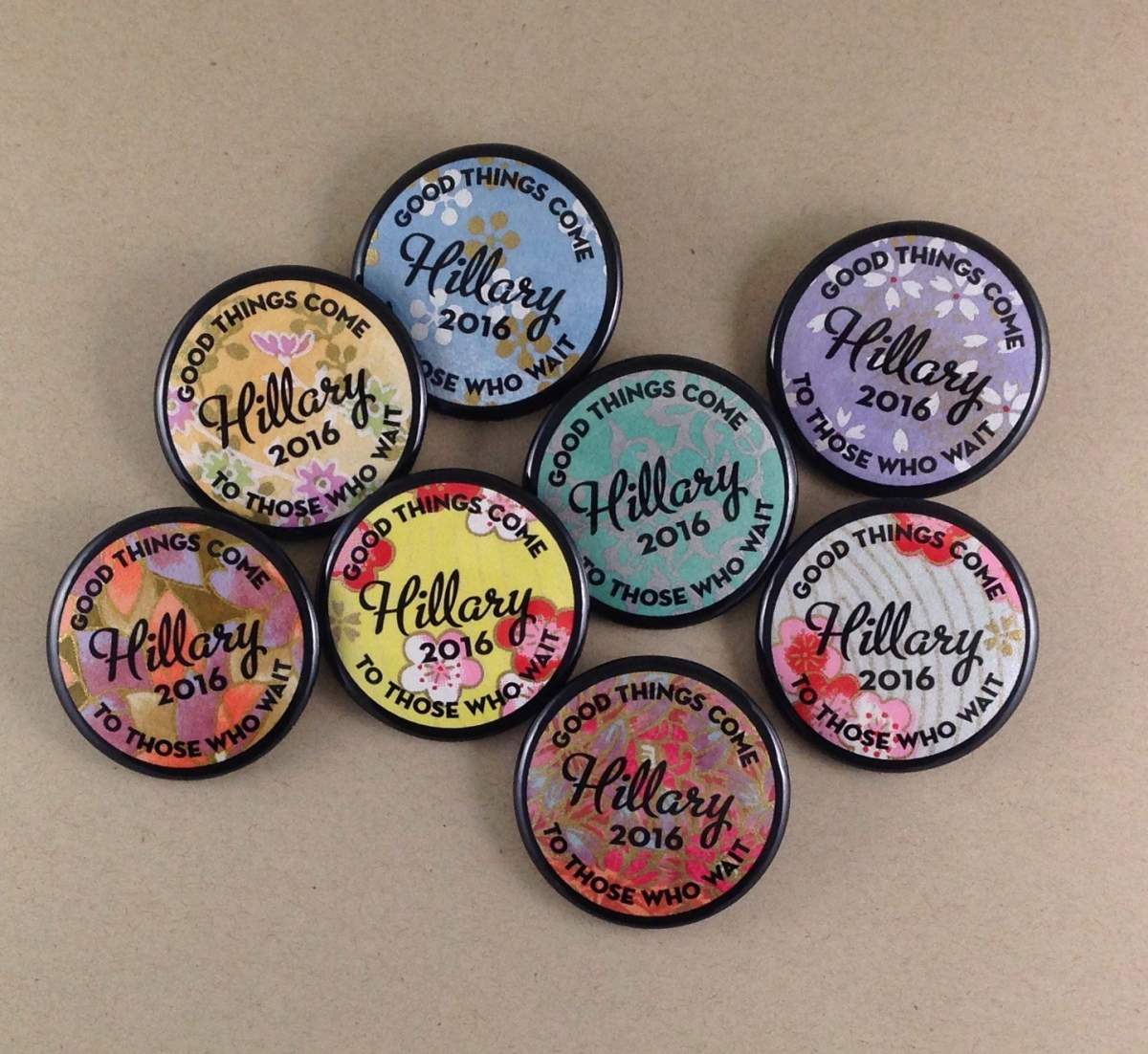 Hillary Clinton buttons with writing: "Good Things Come to Those Who Wait, Hillary 2016."