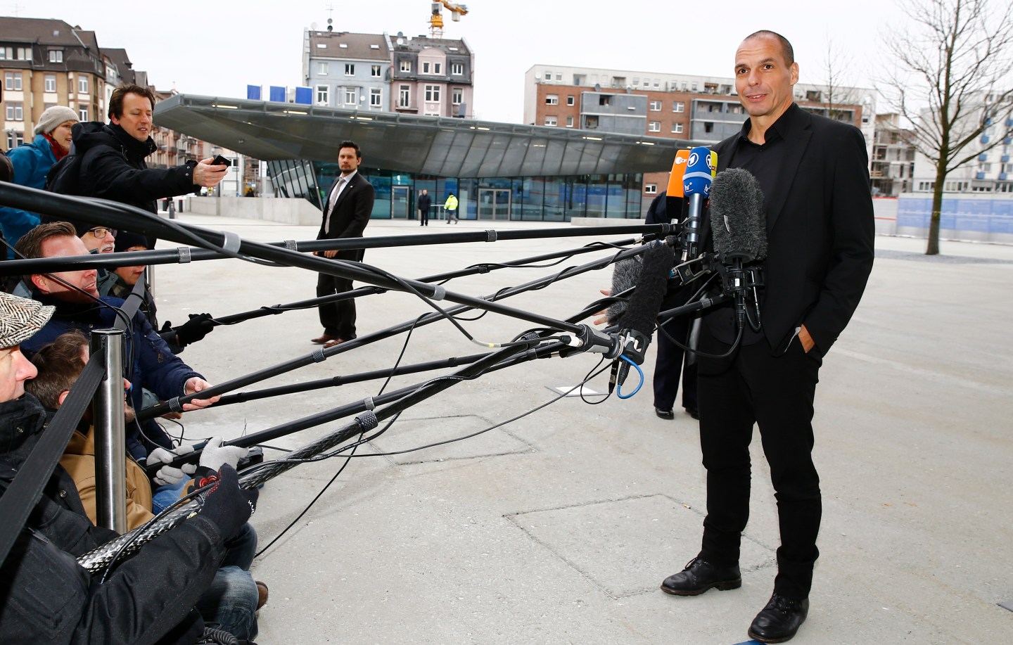 Greek Finance Minister Varoufakis speaks to media outside European Central Bank in Frankfurt