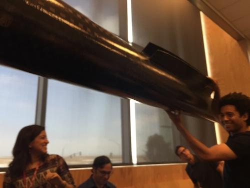 Facebook Connectivity Lab director Yael Maguire shows reporters a carbon fiber pod that's part of the drone. It will house the drone's batteries and motors.