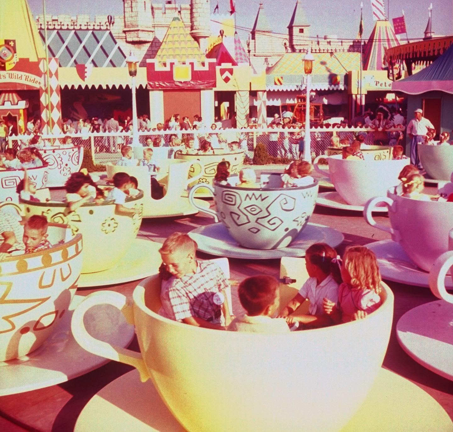 Children on giant teacup ride at Walt Di
