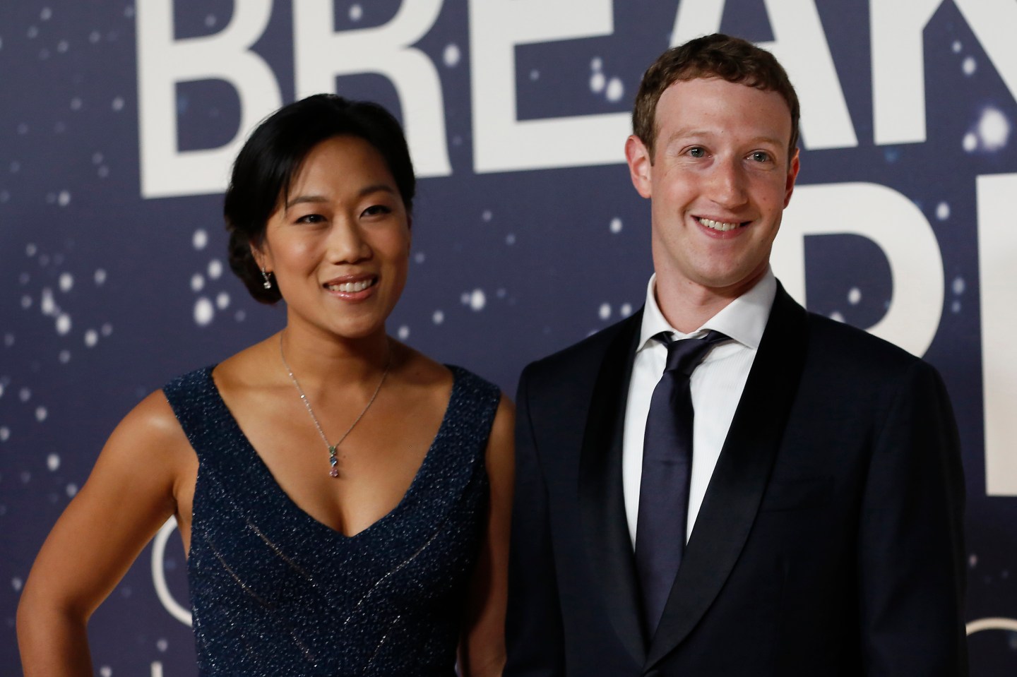 Mark Zuckerberg, founder and CEO of Facebook, and wife Priscilla Chan arrive on the red carpet during the 2nd annual Breakthrough Prize Award in Mountain View, California