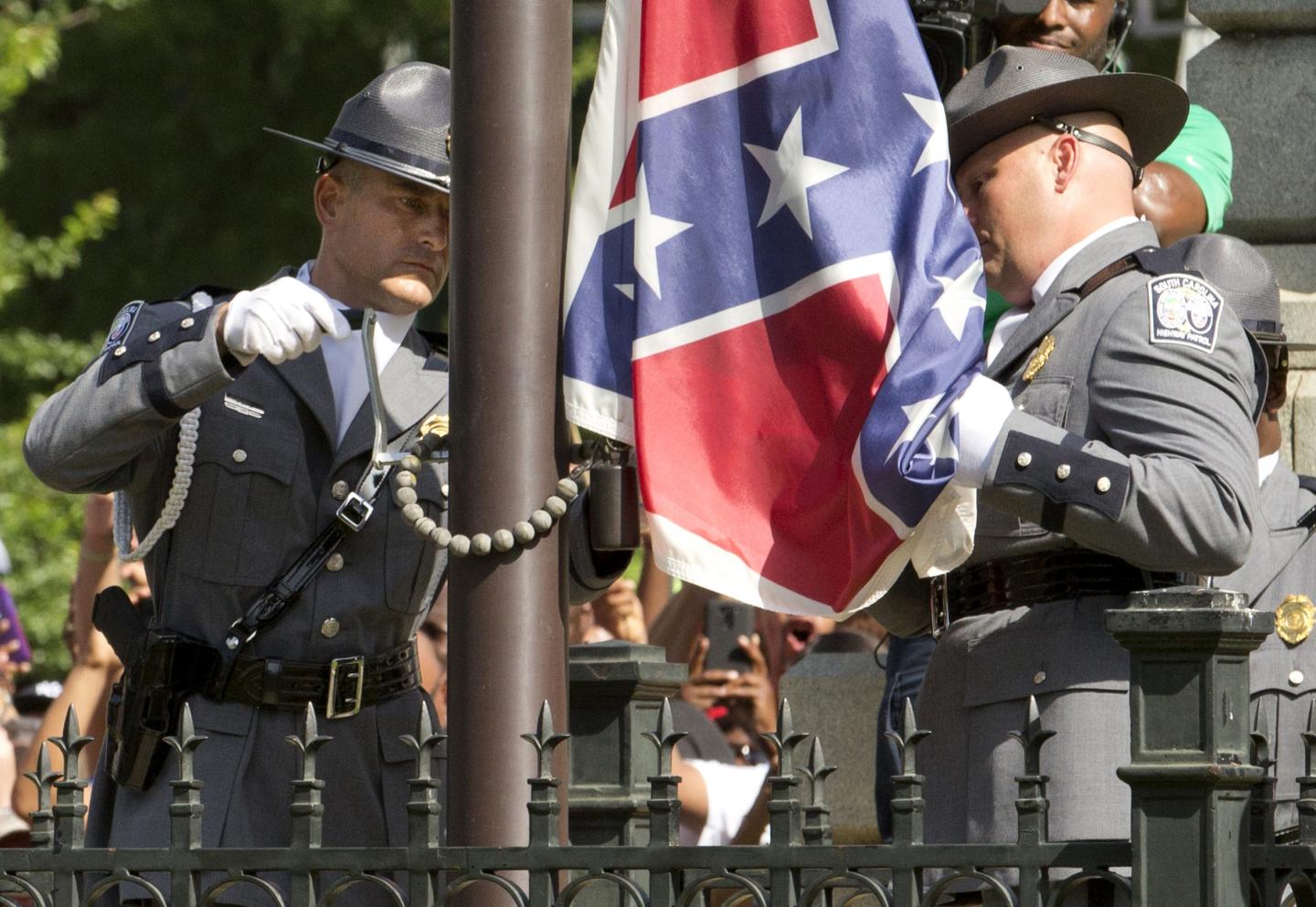 The Confederate battle flag is permanently removed from the South Carolina statehouse grounds during a ceremony in Columbia