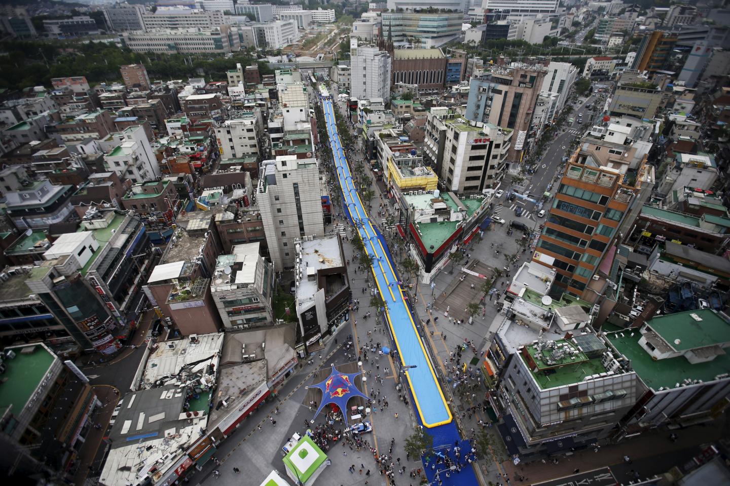 A 350-meter long water slide is seen during 2015 City Silde Festa in central Seoul