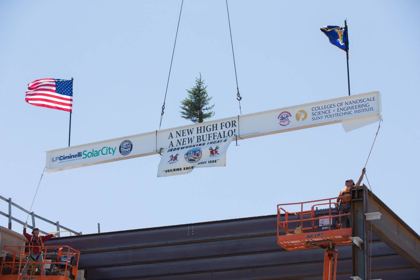 The "topping off" ceremony at SolarCity's factory in upstate New York.