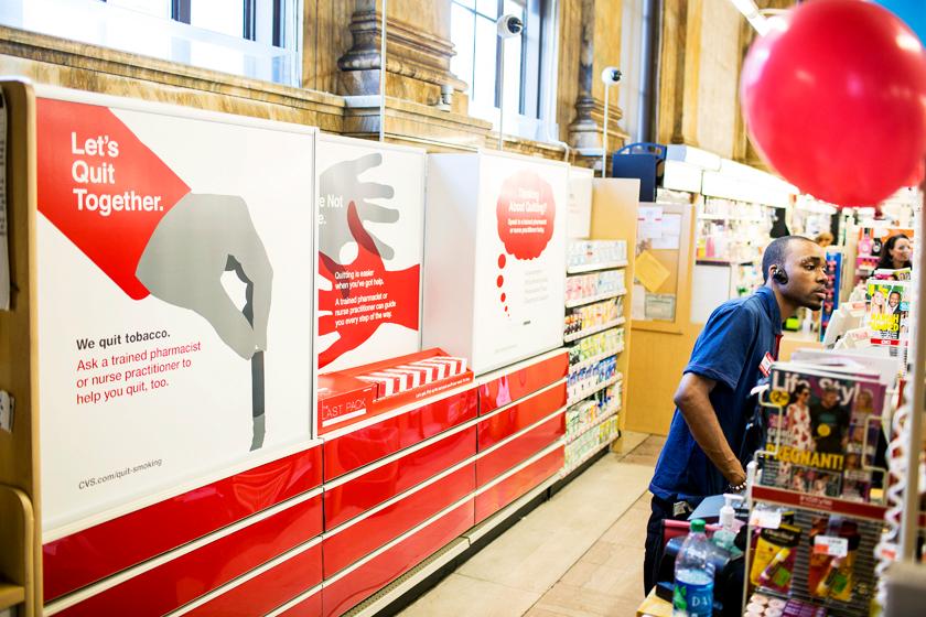 Signage promoting quitting smoking in a space that once held cigarettes at a CVS store in New York.