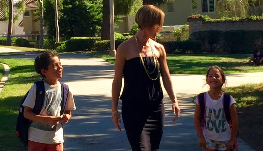 Amy Martinez likes the transition to "mommy mode" while picking up her kids from school every day.