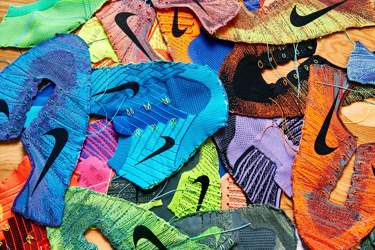 Uppers for Nike Flyknit shoes at the company's Blue Ribbon Studios. Nike spent heavily in time and money to develop the ultra-lightweight technology which has become a big hit.