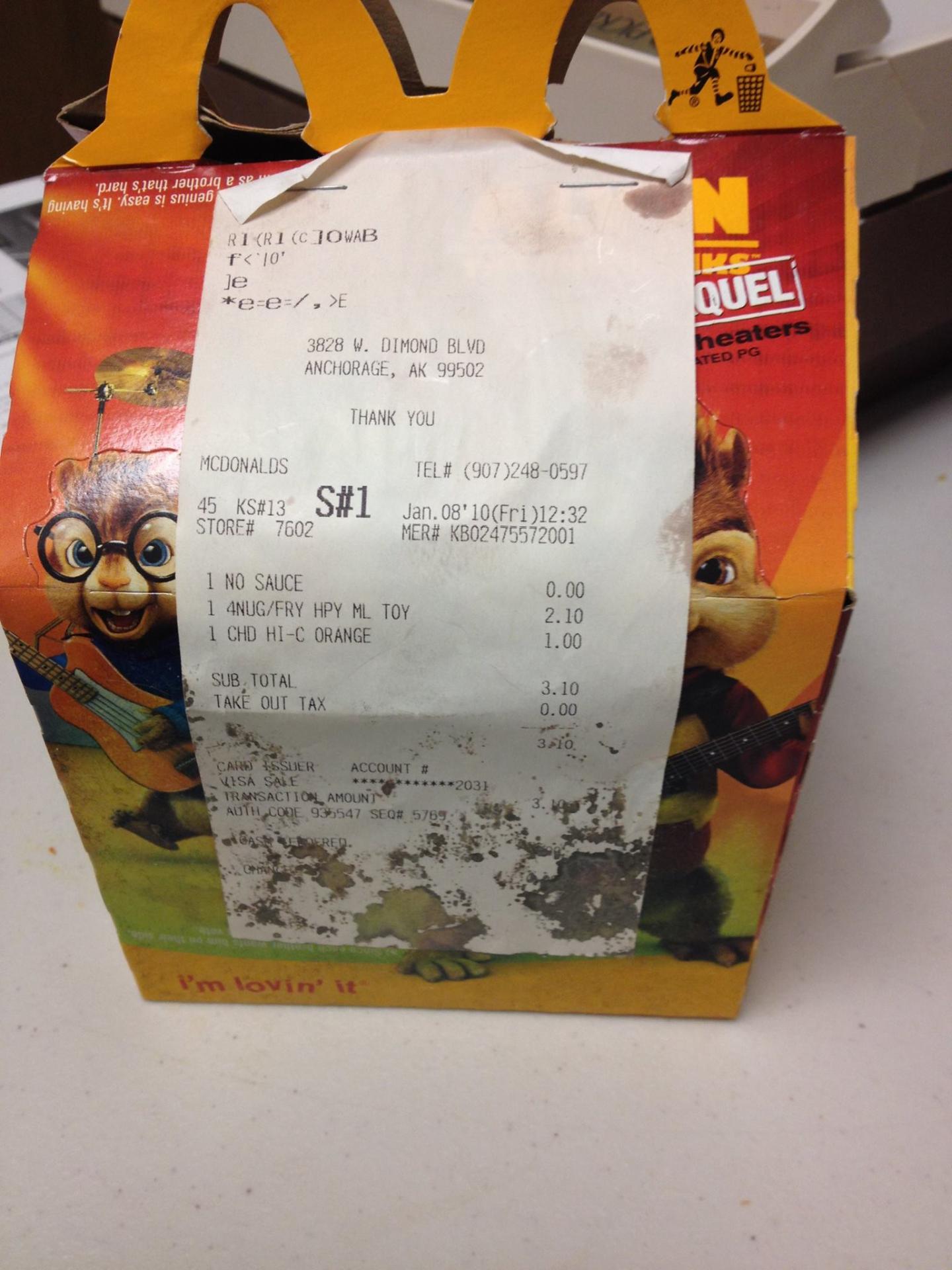 McDonald's Happy Meal with receipt showing purchase date of Jan. 8, 2010.