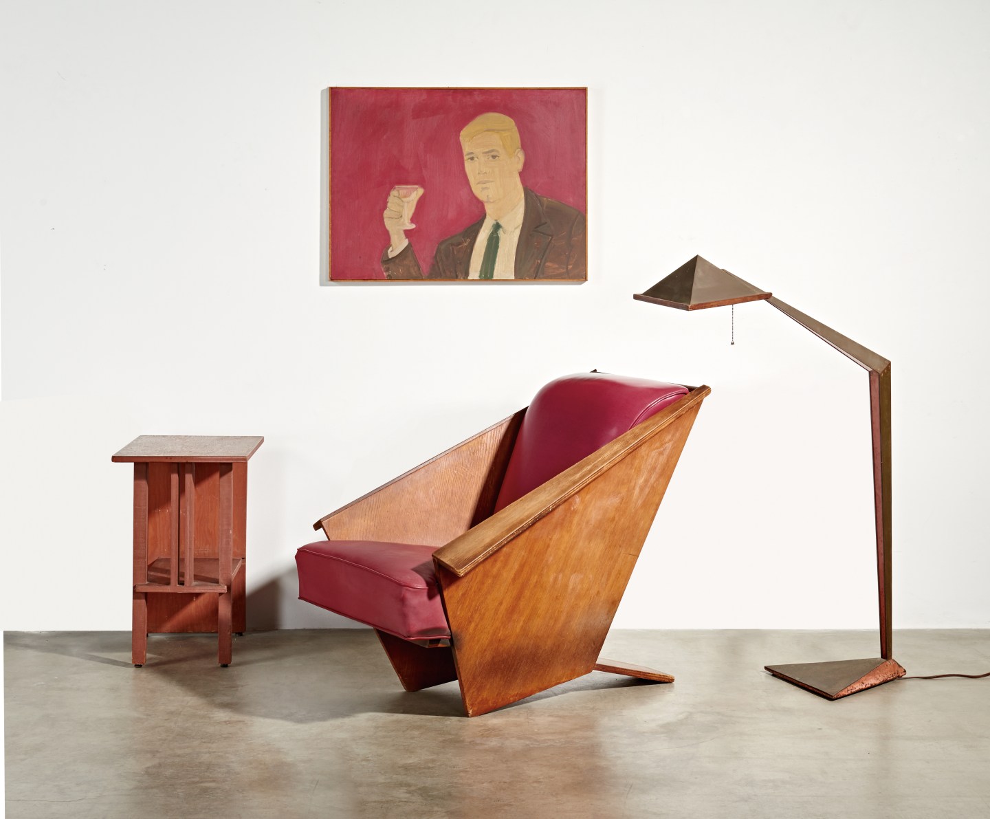 “Origami” lounge chair, “Origami” lamp, and side table. Art by Alex Katz “Here's to You” (1962), all to be sold at auction to benefit The Bridges/Larson Foundation.