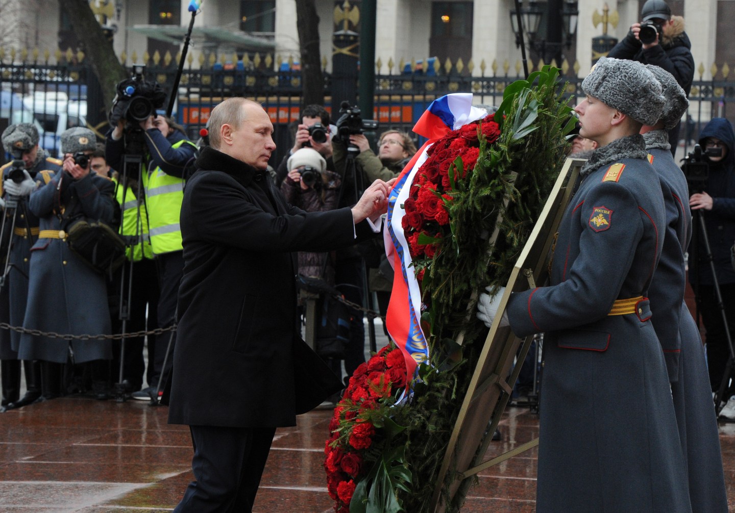 Russian President Putin attends a wreath laying ceremony to mark the Defender of the Fatherland Day in Moscow
