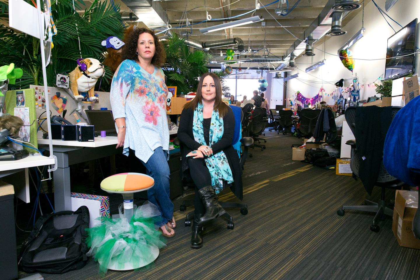 Hollie Delaney (left) used self-management to find new roles for herself after her job was reconfigured. Christa Foley says she initially reconfigured. Christa Foley says she initially hated holacracy's endless rules.