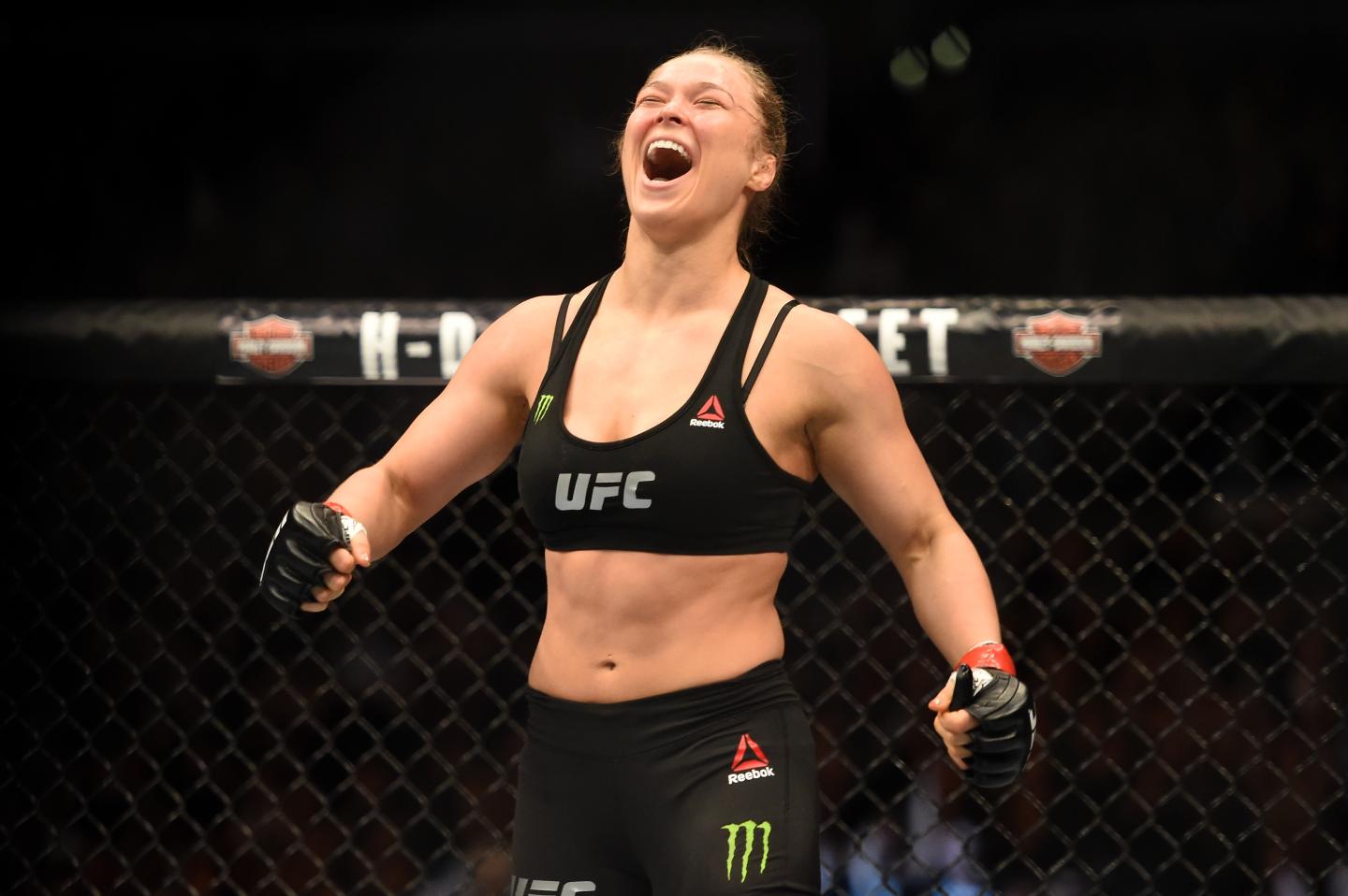 <> in their UFC women's bantamweight championship bout during the UFC 184 event at Staples Center on February 28, 2015 in Los Angeles, California.