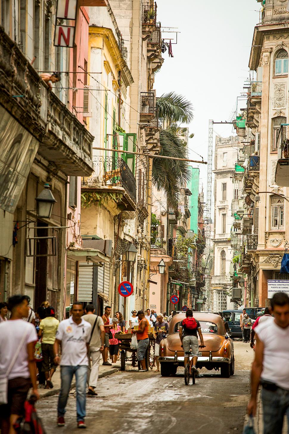 The streetscape of downtown Havana (top) offers an alternative to the kind of mass tourism that Airbnb CEO co-founder Brian Chesky has criticized.