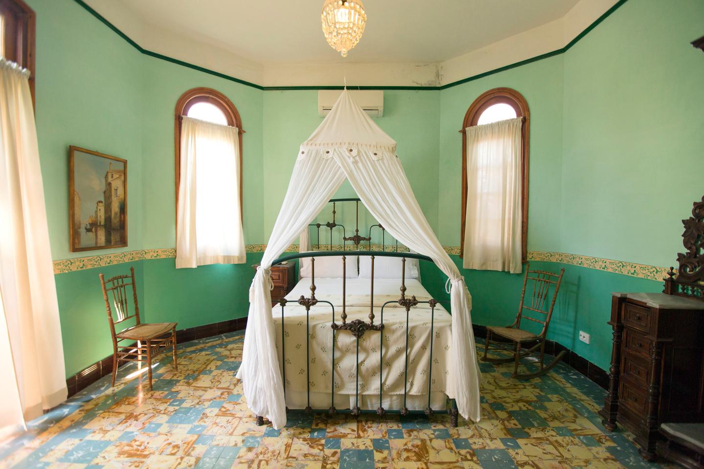 Bedroom in "La Rosa de Ortega" listing—an Airbnb listing in Havana.