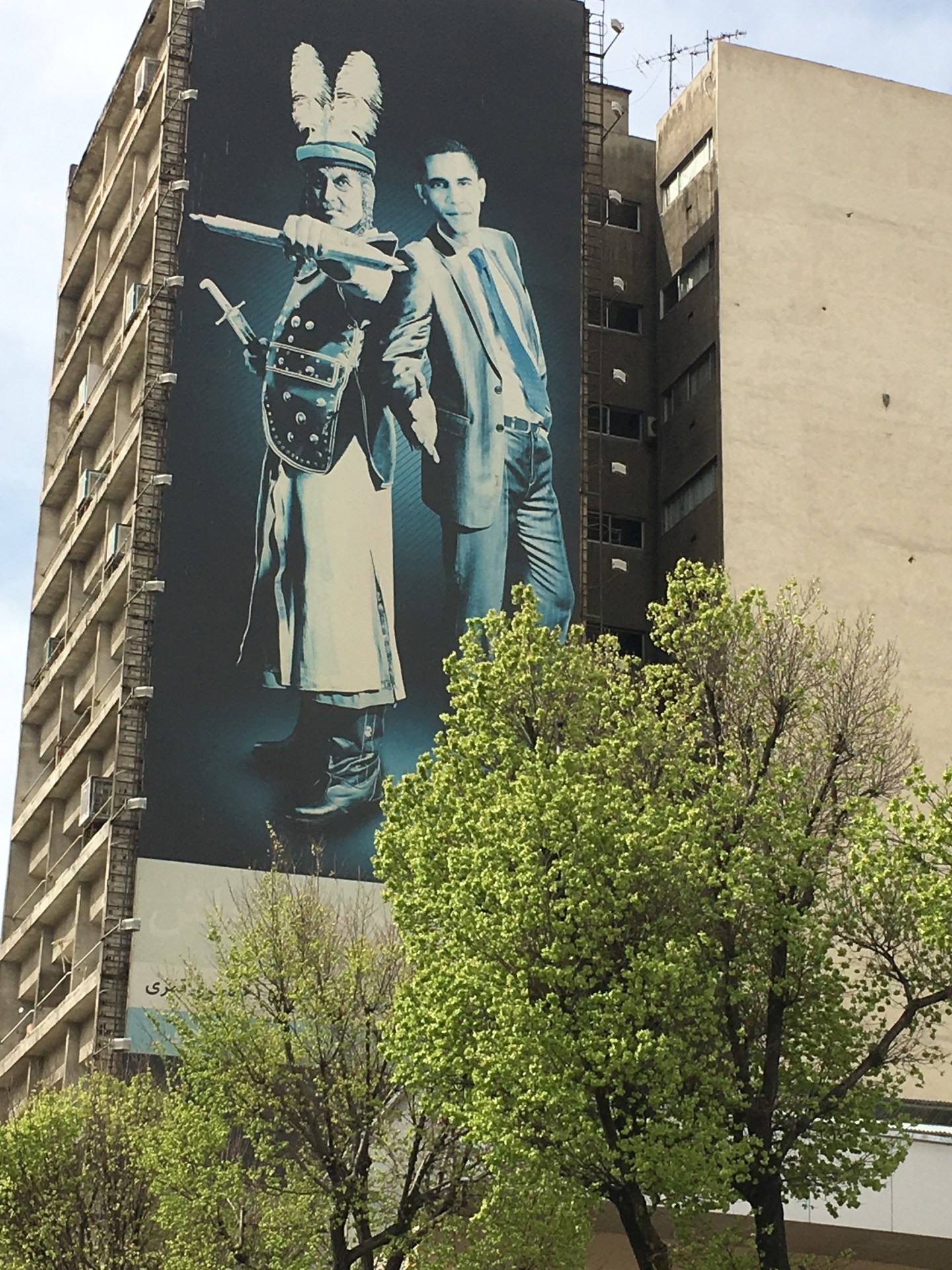 A mural in downtown Tehran shows President Obama with the 7th-century villain Shemr, who killed the Shiite Muslims' leader Hussein. The cryptic artwork suggests Obama cannot be trusted.