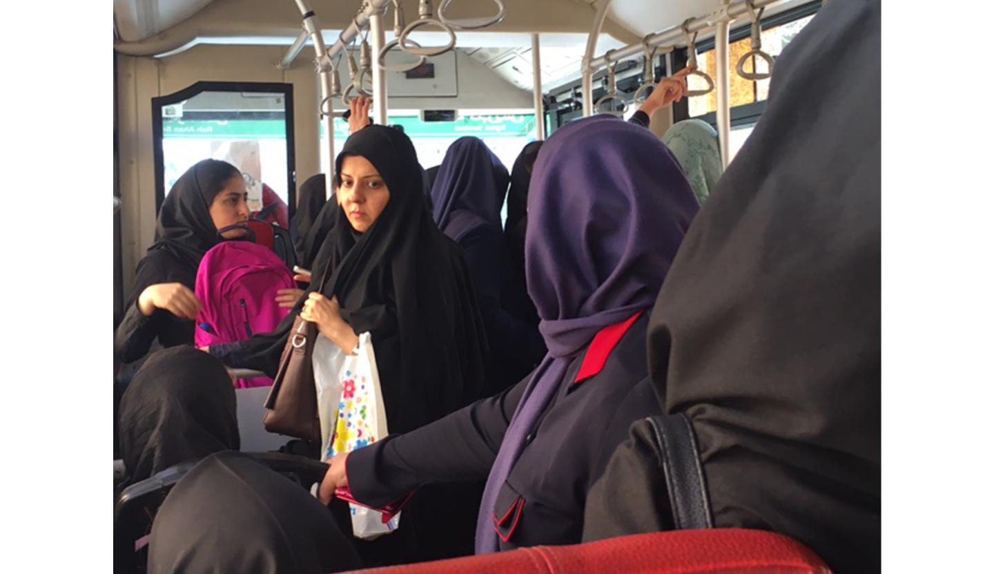 The women's-only section on a Tehran bus. Since Iran's strict Islamic laws limit casual contact between the sexes, men and women ride separately.