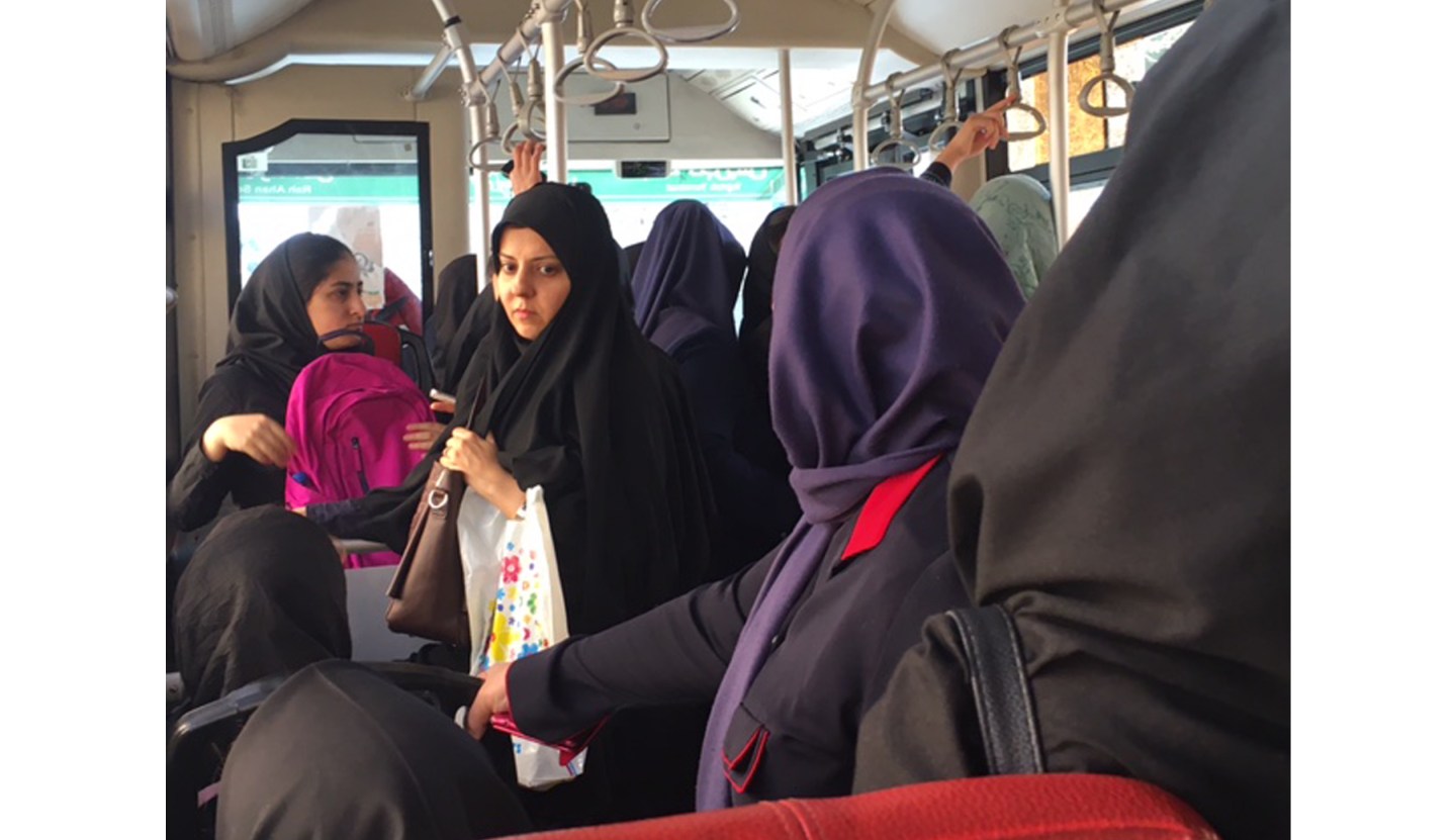 The women's-only section on a Tehran bus. Since Iran's strict Islamic laws limit casual contact between the sexes, men and women ride separately.
