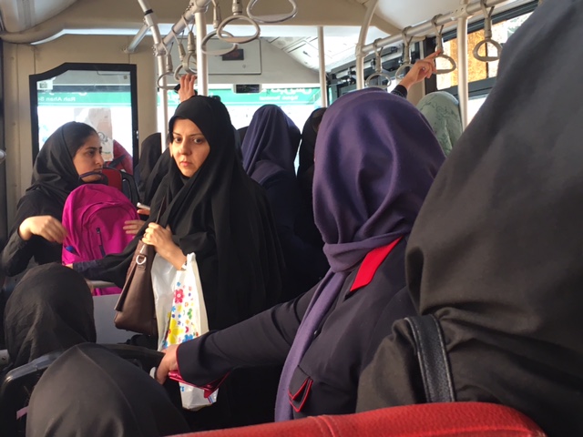 The women's-only section on a Tehran bus. Since Iran's strict Islamic laws limit casual contact between the sexes, men and women ride separately.