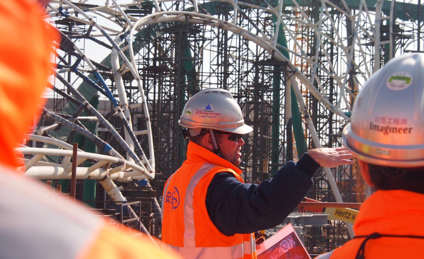 Drake leads one his many site walks to review construction progress on Tomorrowland in July 2015. 