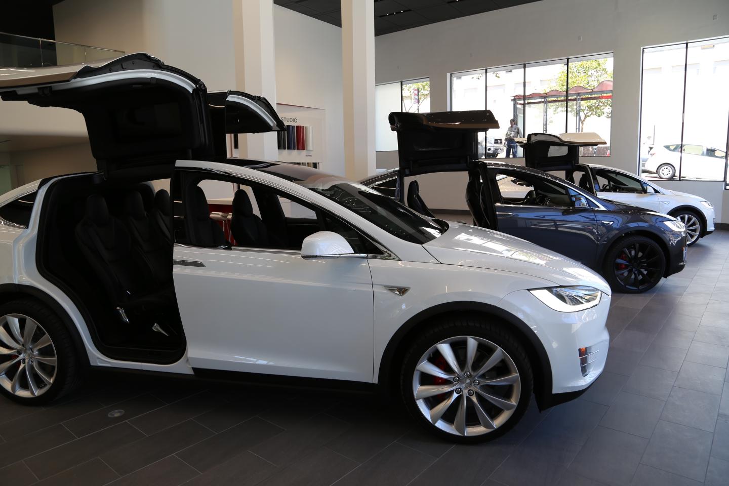 Tesla's Model X SUV cars are on display