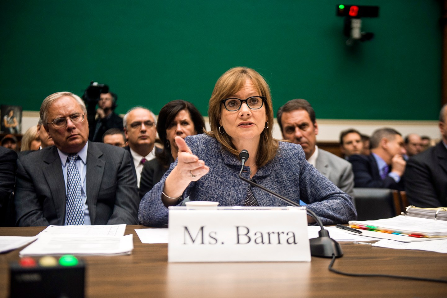 Michael Millikin, left, General Motor's general counsel, looks on as Mary Barra, GM's chief executive, testifies before Congress on Capitol Hill in Washington.