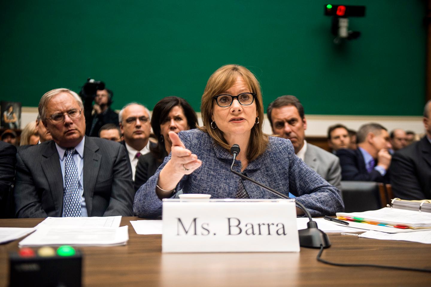 Michael Millikin, left, General Motor's general counsel, looks on as Mary Barra, GM's chief executive, testifies before Congress on Capitol Hill in Washington.