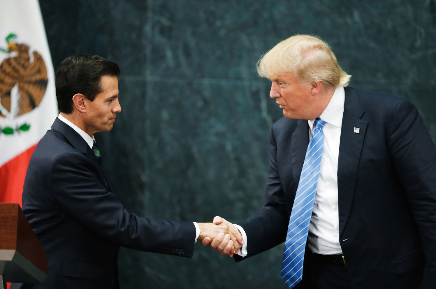 U.S. presidential nominee Trump and Mexico's President Pena Nieto shake hands in Mexico City