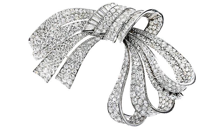 A Van Cleef & Arpels brooch set with single-cut and old European diamonds.