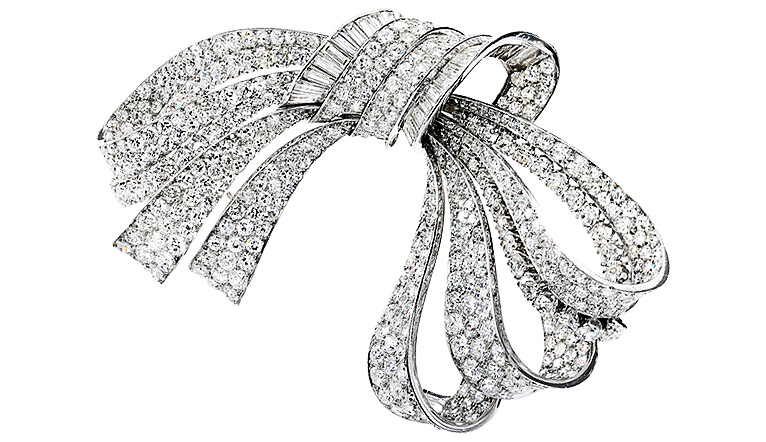 A Van Cleef & Arpels brooch set with single-cut and old European diamonds.