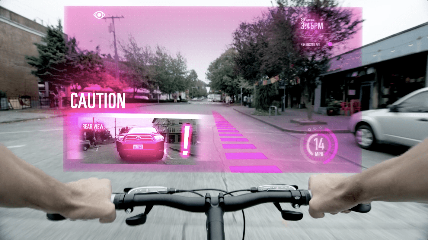 A bicyclist avoids a car thanks to wireless AR warning.