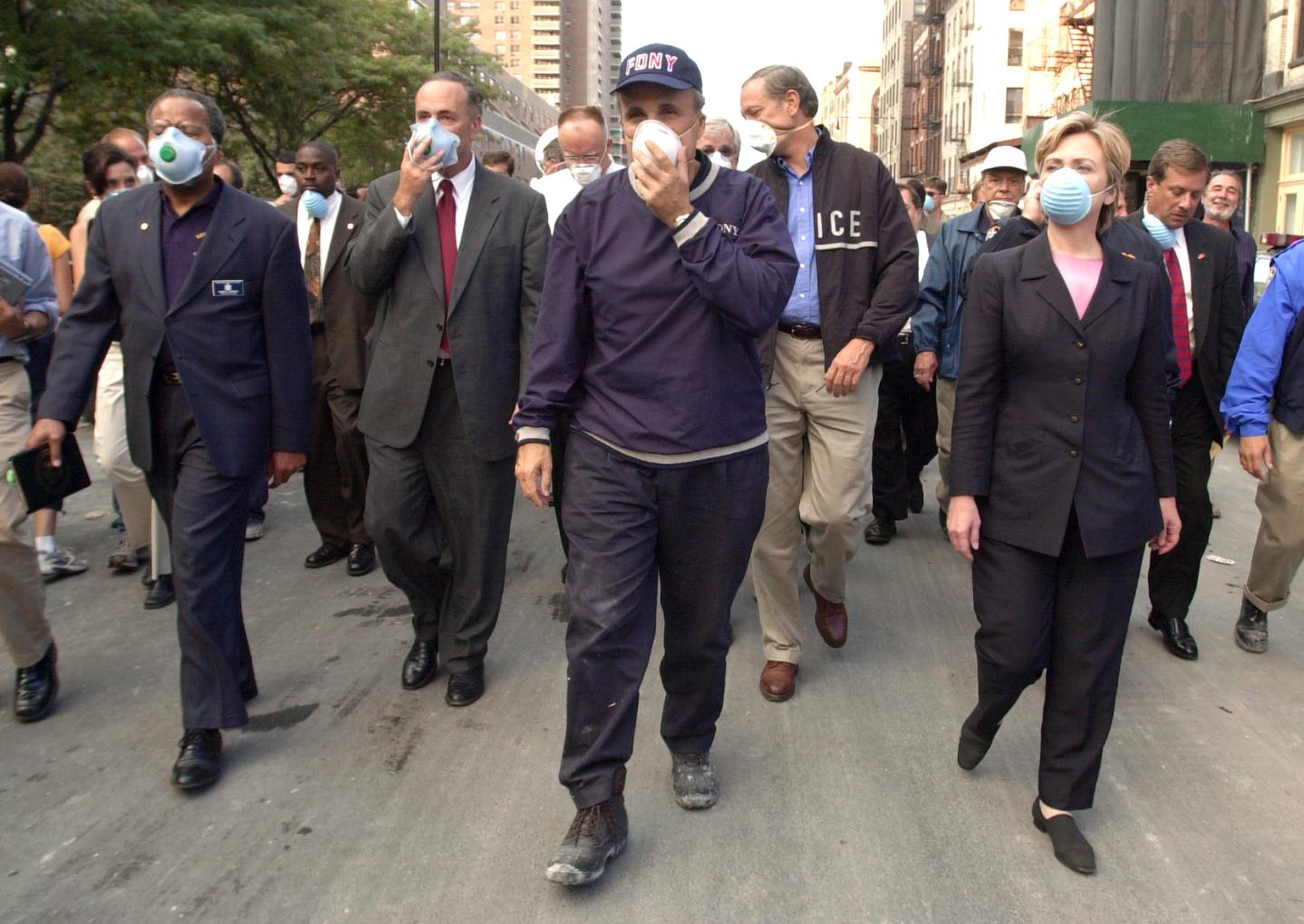 New York City Mayor Rudolph Giuliani (C) leads US