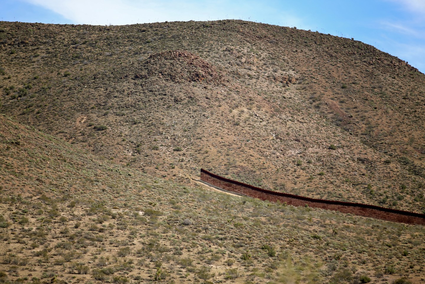 The Wider Image: Along the U.S. - Mexico border fence