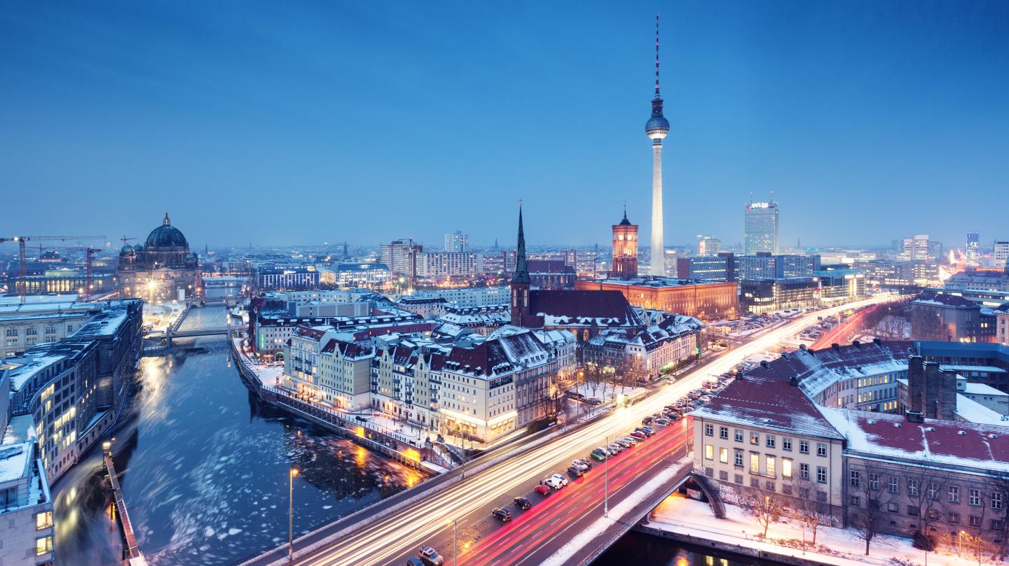 Berlin winter skyline with snow on the roofs