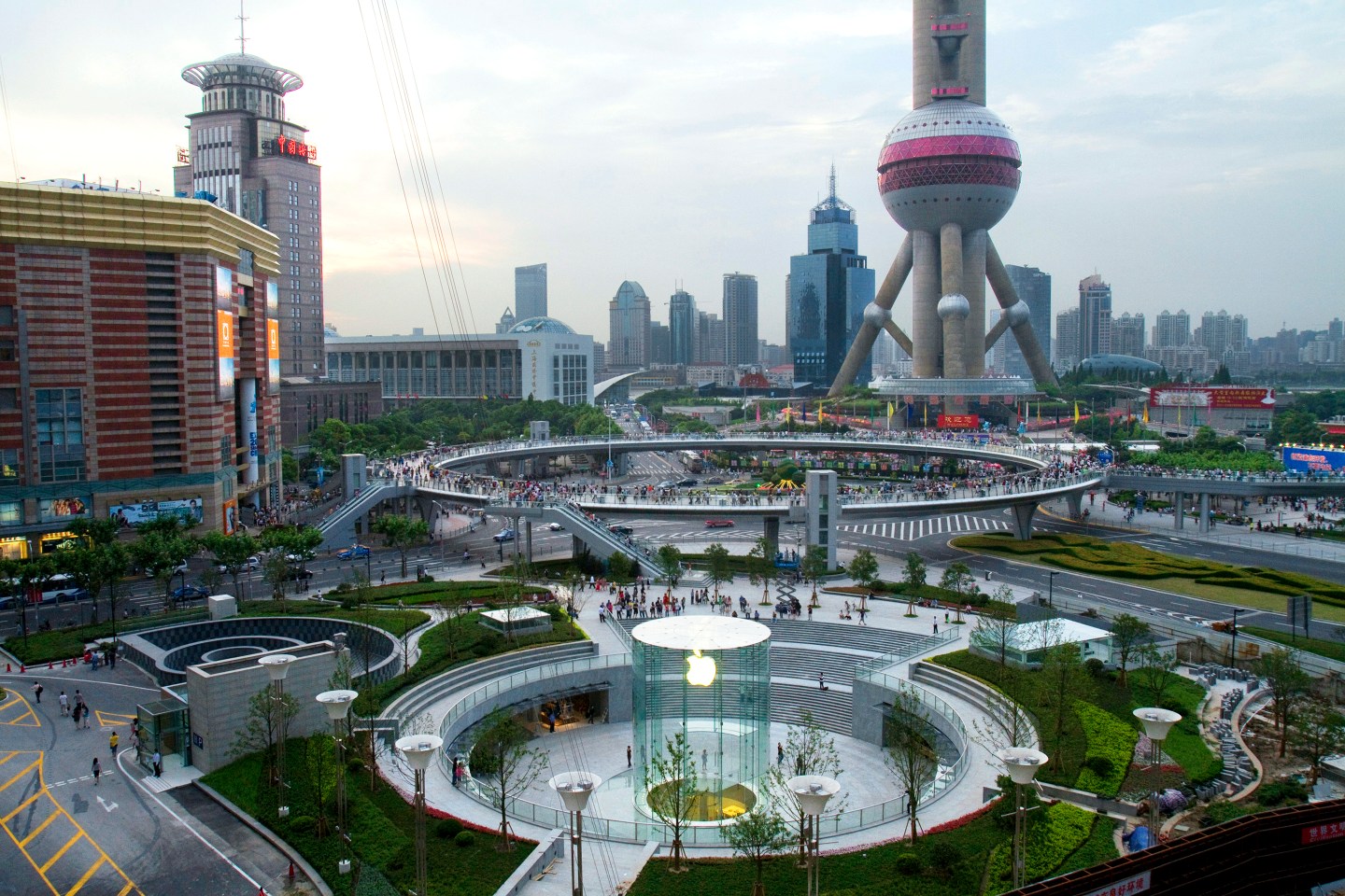 Apple's new flagship store stands in front of the Oriental Pearl Tower in Shanghai.