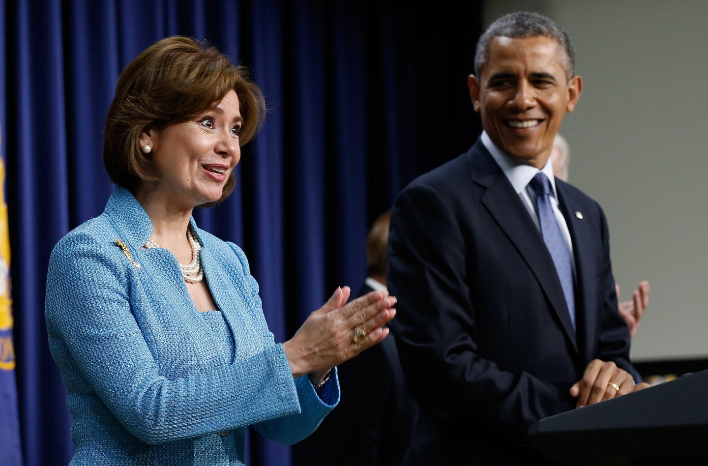Maria Contreras-Sweet stands next to President Barack Obama at her swearing-in as Small Business Administration Chief