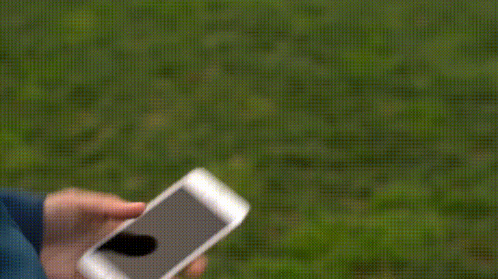 A person compares Apple iPhone 8 Touch ID with iPhone X Face ID