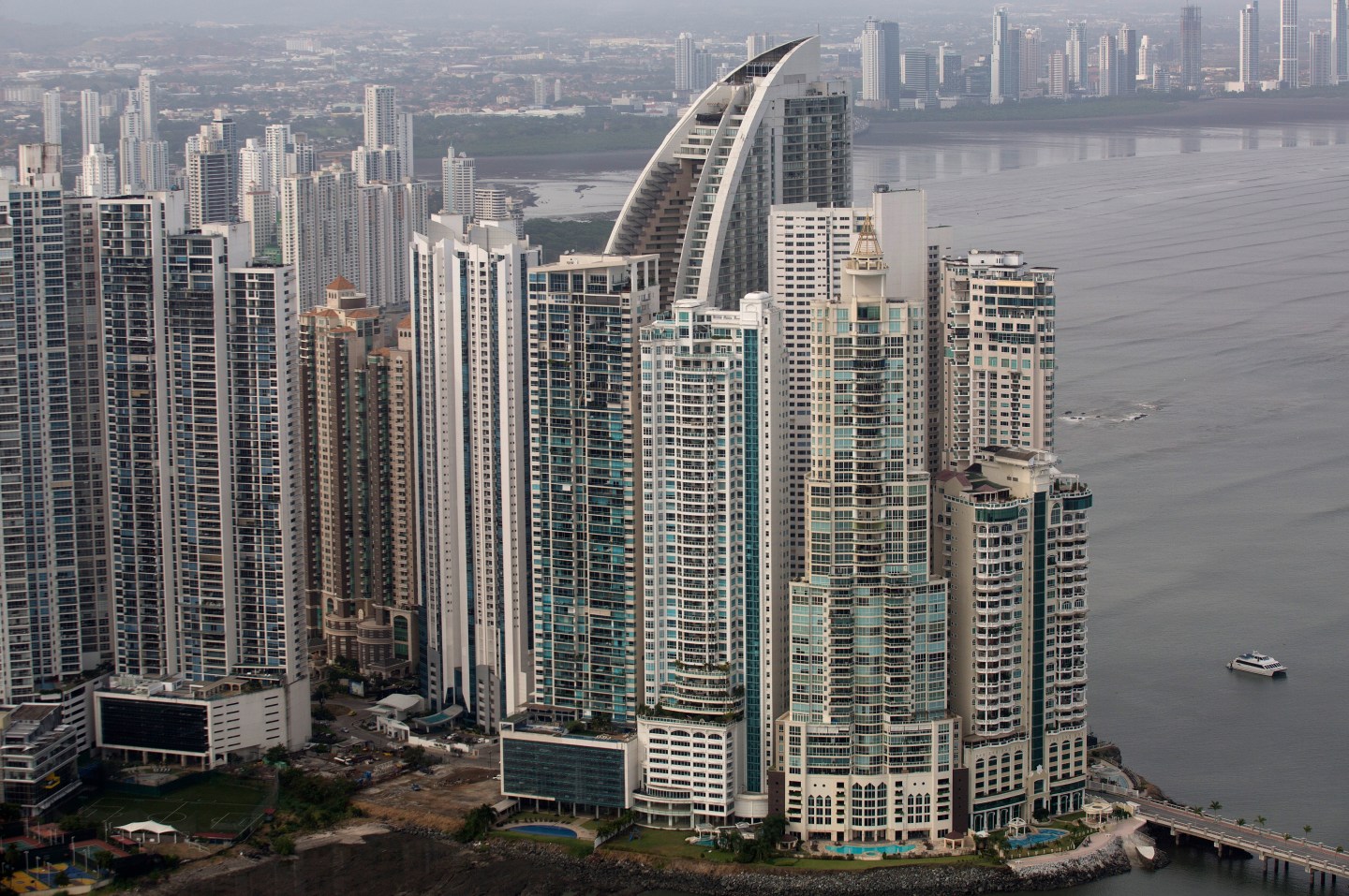Buildings stand in the skyline, including the Trump Ocean C