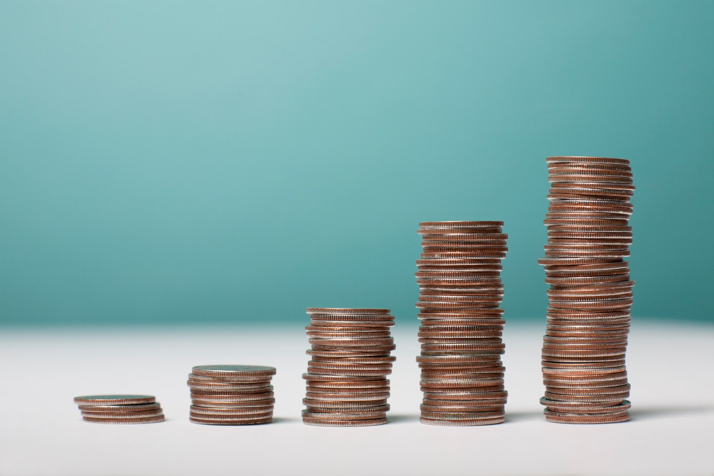 Studio shot of stacks of coins