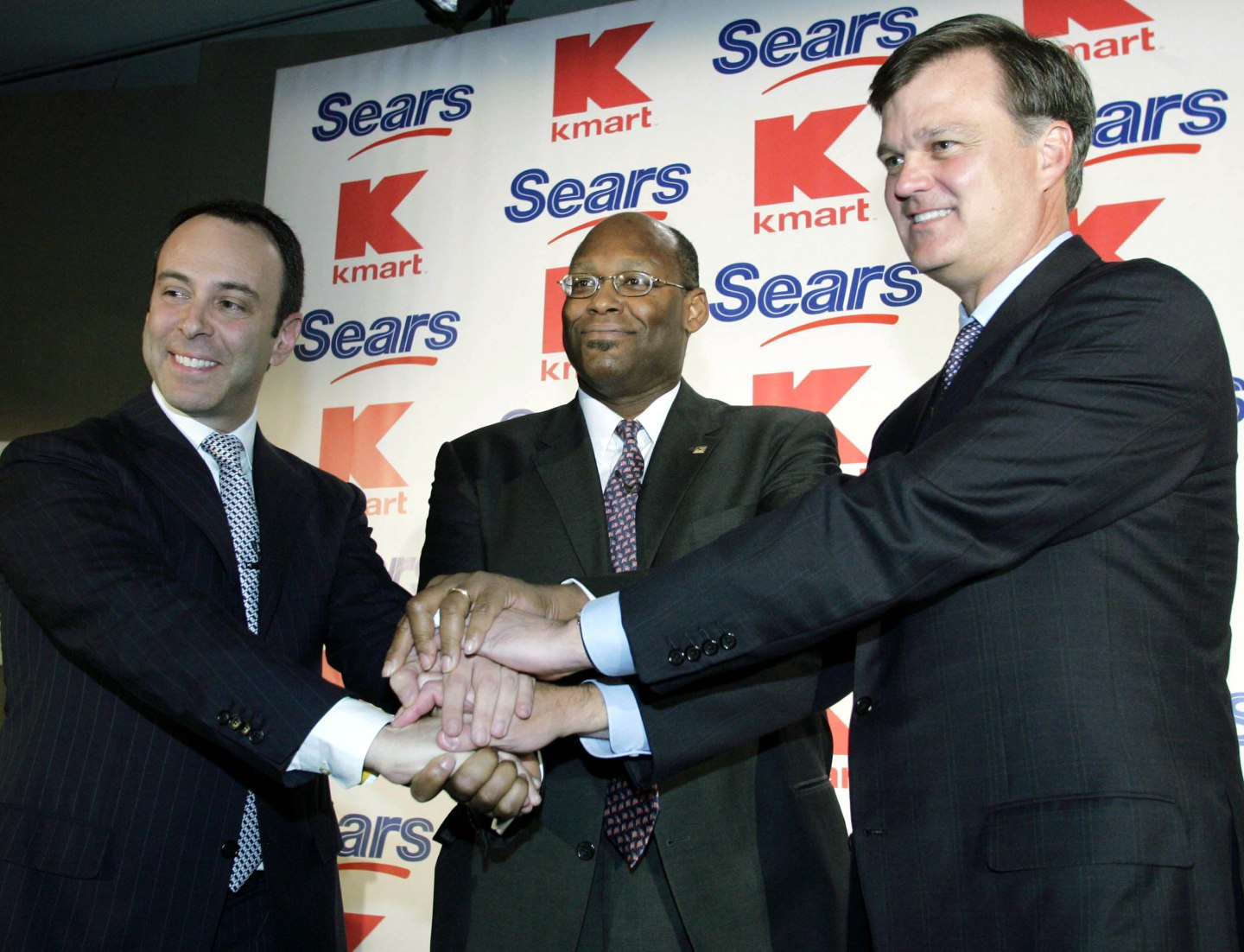 Handshake at Sears Kmart press conference in New York.