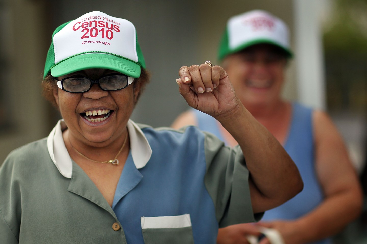Woman wears Census 2010 hat