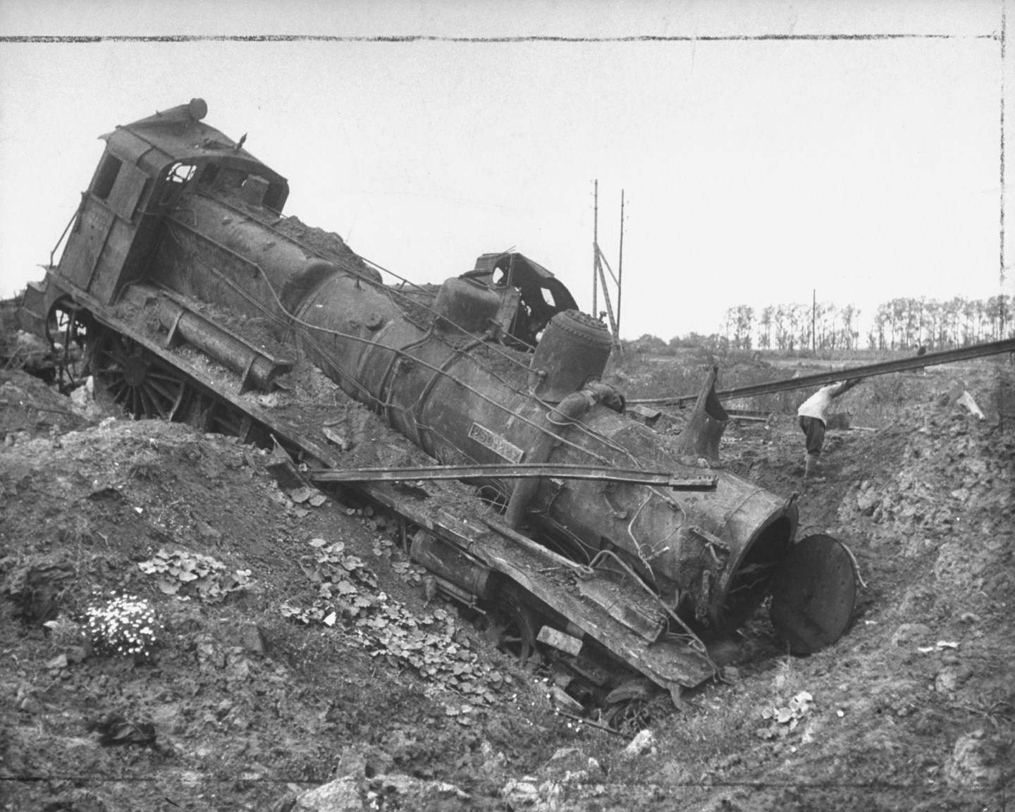 Bombed French railroad engine. (Photo b