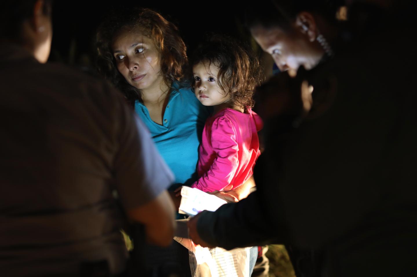 Border Patrol Agents Detain Migrants Near US-Mexico Border