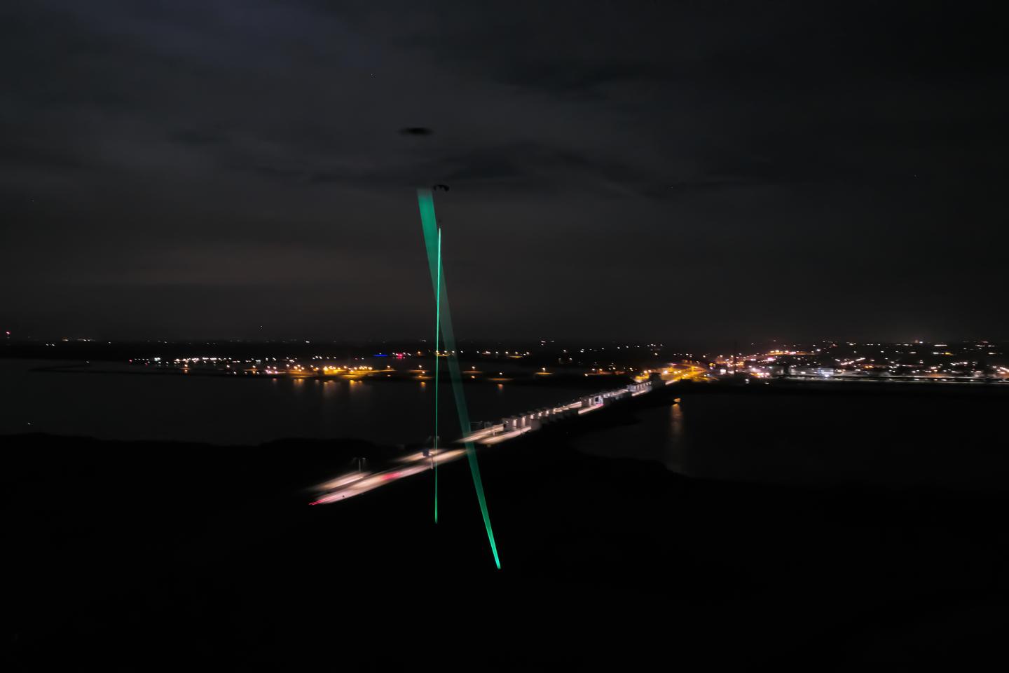 Glowing lines tether kites to dynamo generators in Studio Roosegarde’s "Windvogel."