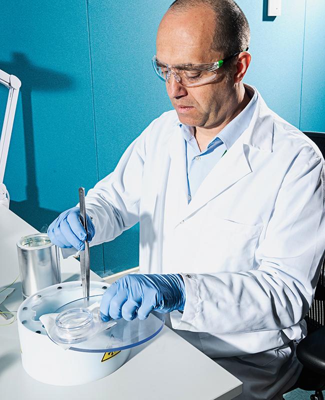 a scientist prepares for testing
