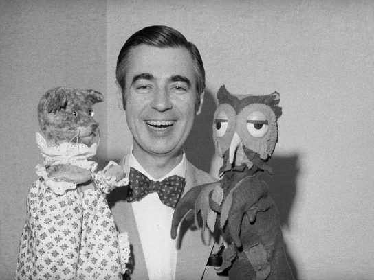 Mister Rogers with puppets race ahead