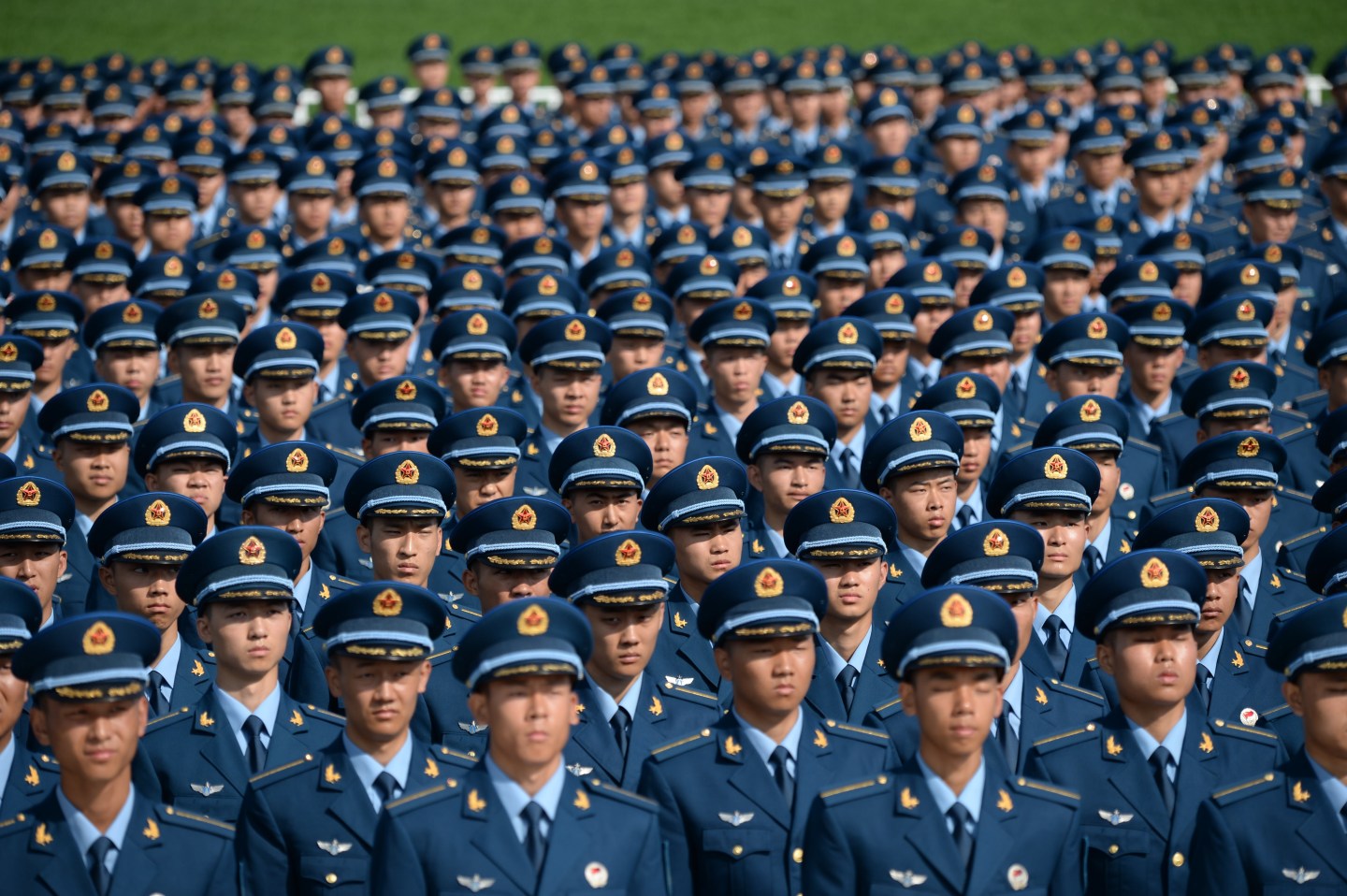 CHANGCHUN, CHINA - AUGUST 30: New pilots of Chinese air force attends the Chinese People's Liberation Army (PLA) air force aviation open day at PLA Air Force Aviation University on August 30, 2018 in Changchun, Jilin Province of China. People's Liberation Army Air Force (PLAAF) holds aviation open day activities featuring 'Dream High in Aerospace' to welcome more than 1,400 new pilots in Changchun from August 30 to September 2. (Photo by Yu Hongchun/Visual China Group via Getty Images)
