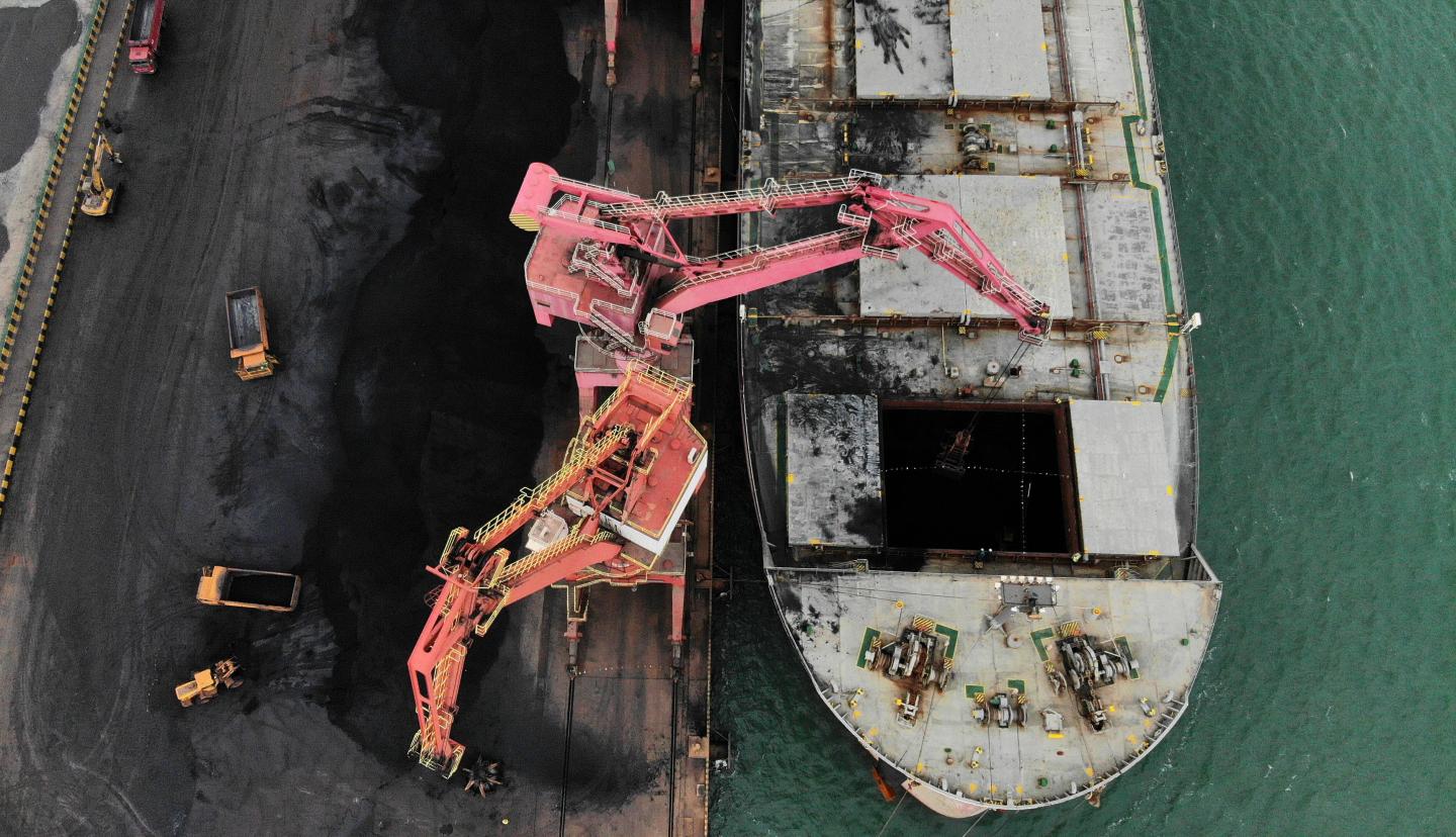 RIZHAO, Nov. 21, 2019 -- Aerial photo taken on Nov. 21, 2019 shows a cargo ship being loaded up with coal at Rizhao Port in Rizhao, east China's Shandong Province. (Photo by Wang Kai/Xinhua via Getty) (Xinhua/Wang Kai via Getty Images)