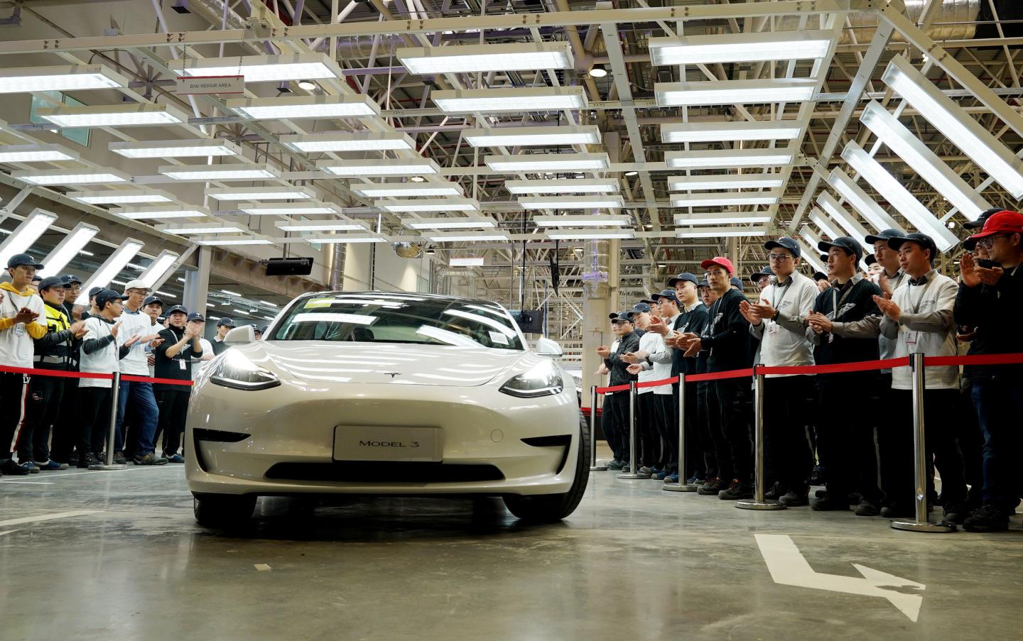 SHANGHAI, Dec. 30, 2019 -- A Tesla Model 3 vehicle arrives at a delivery ceremony in Shanghai, east China, Dec. 30, 2019. The first batch of vehicles produced by Tesla's overseas plant in Shanghai was delivered to customers Monday. (Photo by Fang Zhe/Xinhua via Getty) (Xinhua/Fang Zhe via Getty Images)
